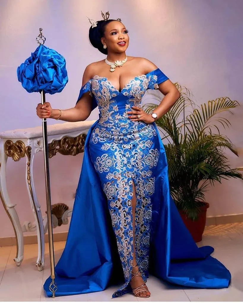 Beautiful Blue Efik Onyonyo Dress With White Beads and Hair Combs