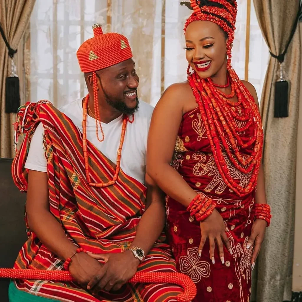 Ivie is in the full Edo traditional wedding attire for a bride