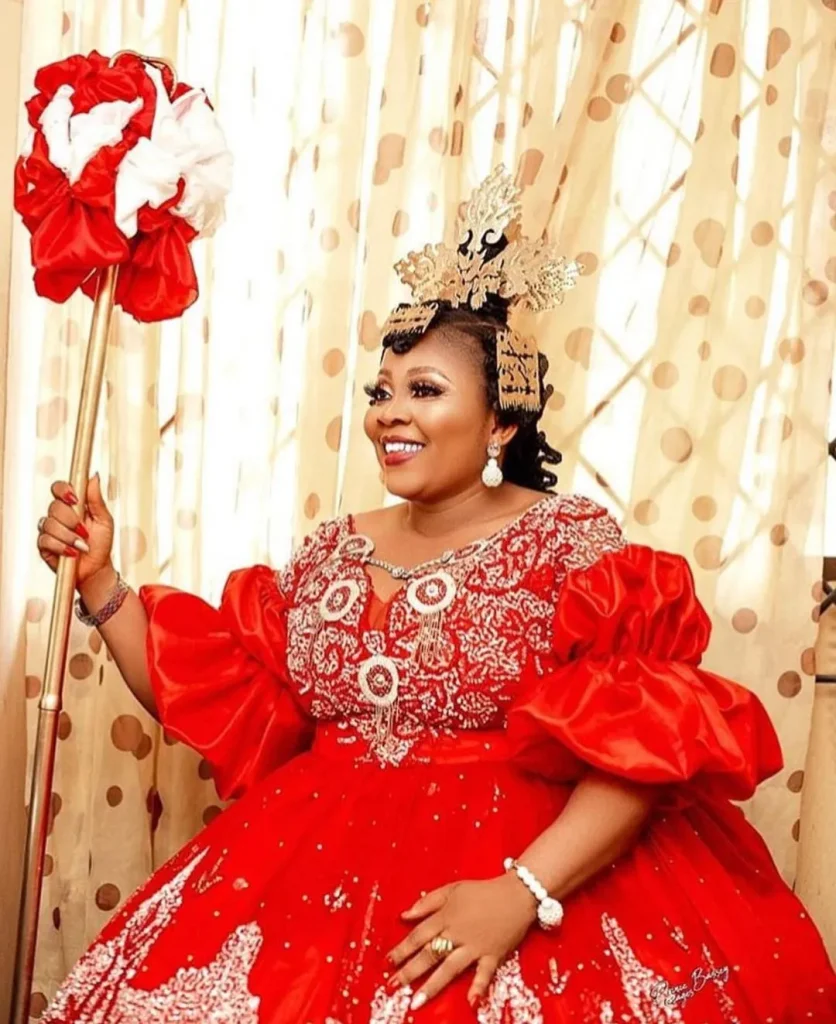 Efik Bride In Beautiful Red Peplum Onyonyo Dress With Comb Wig and Staff