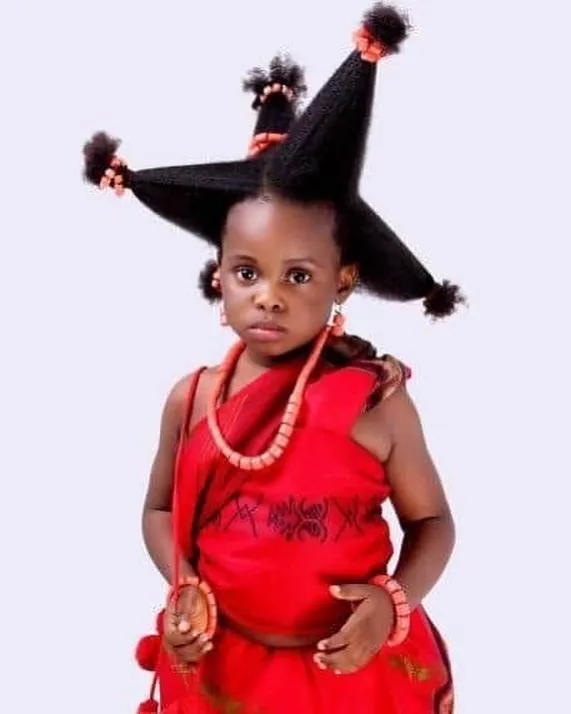 Ogoni maiden in the traditional "koo" hairstyle