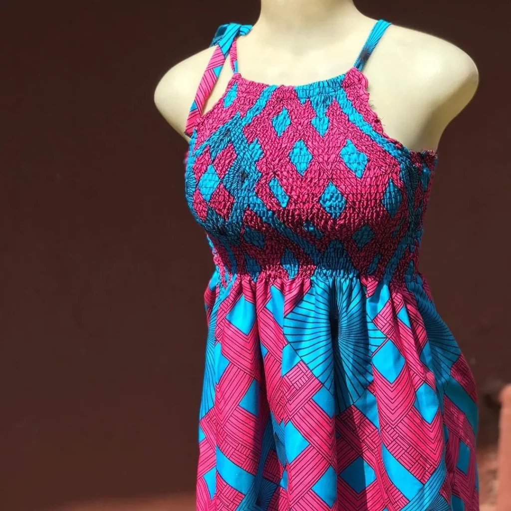 Ankara Wax PrintPink and blue Fit and flare Bodycon Elastic Smocked Dress