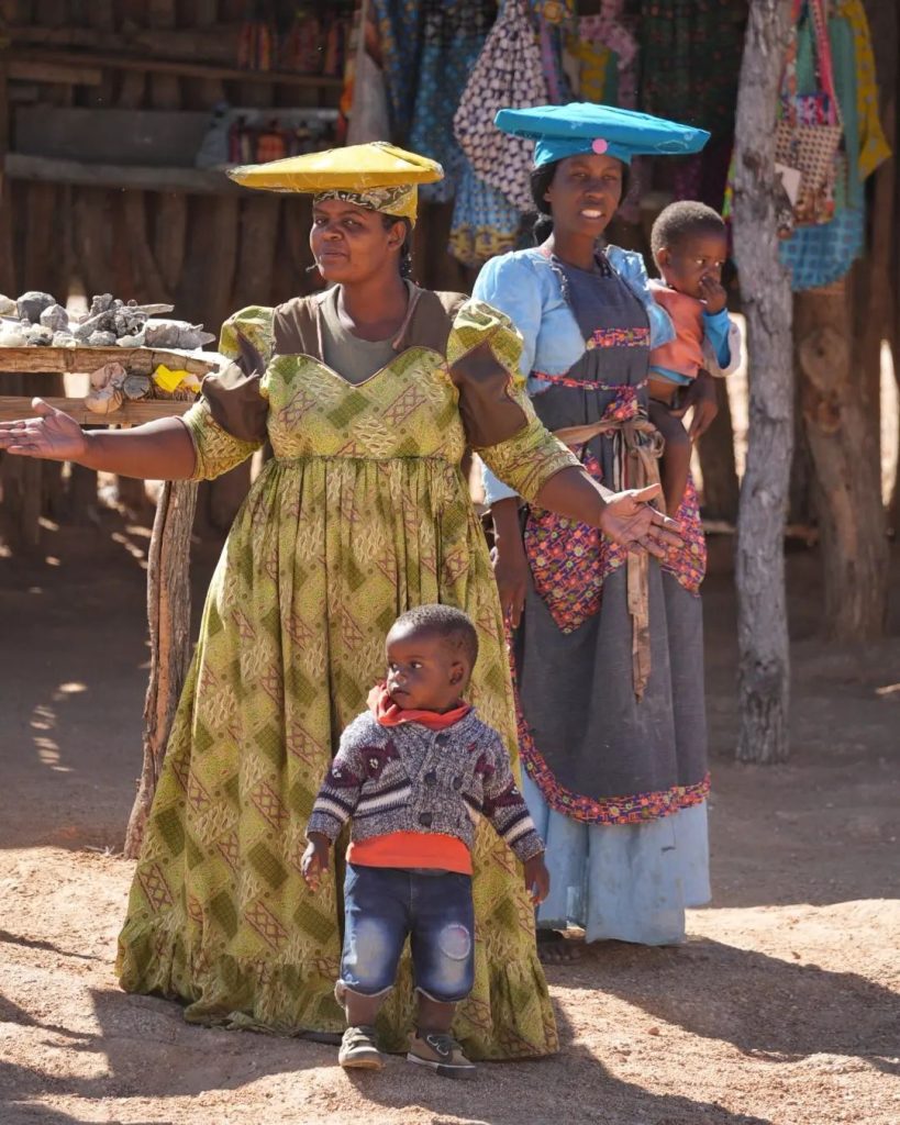 traditional Herero hat, a horizontal horned headdress called an otjikaiva which is a symbol of respect and pays homage