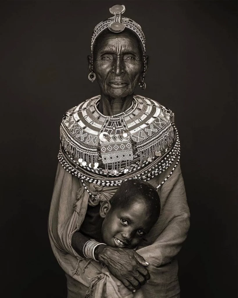 Tribal Kenyan woman with her grandson
