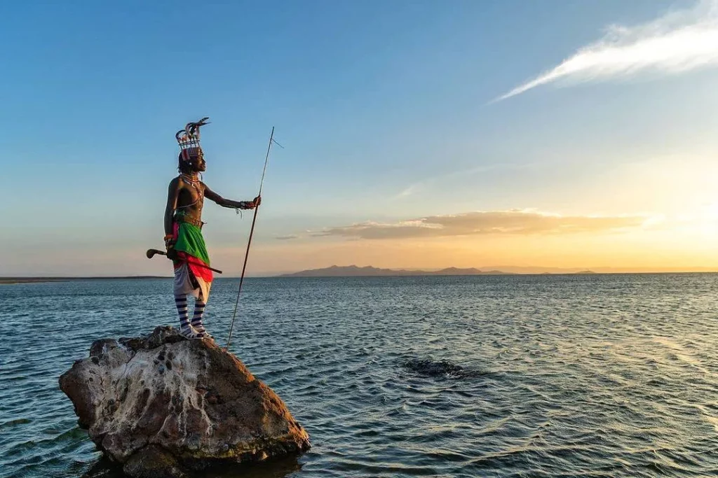 Young moran warrior standing by Lake Turkana 