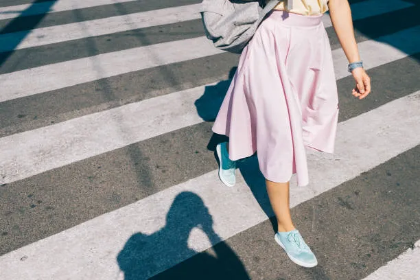 Light pink flare dress with baby blue sneakers